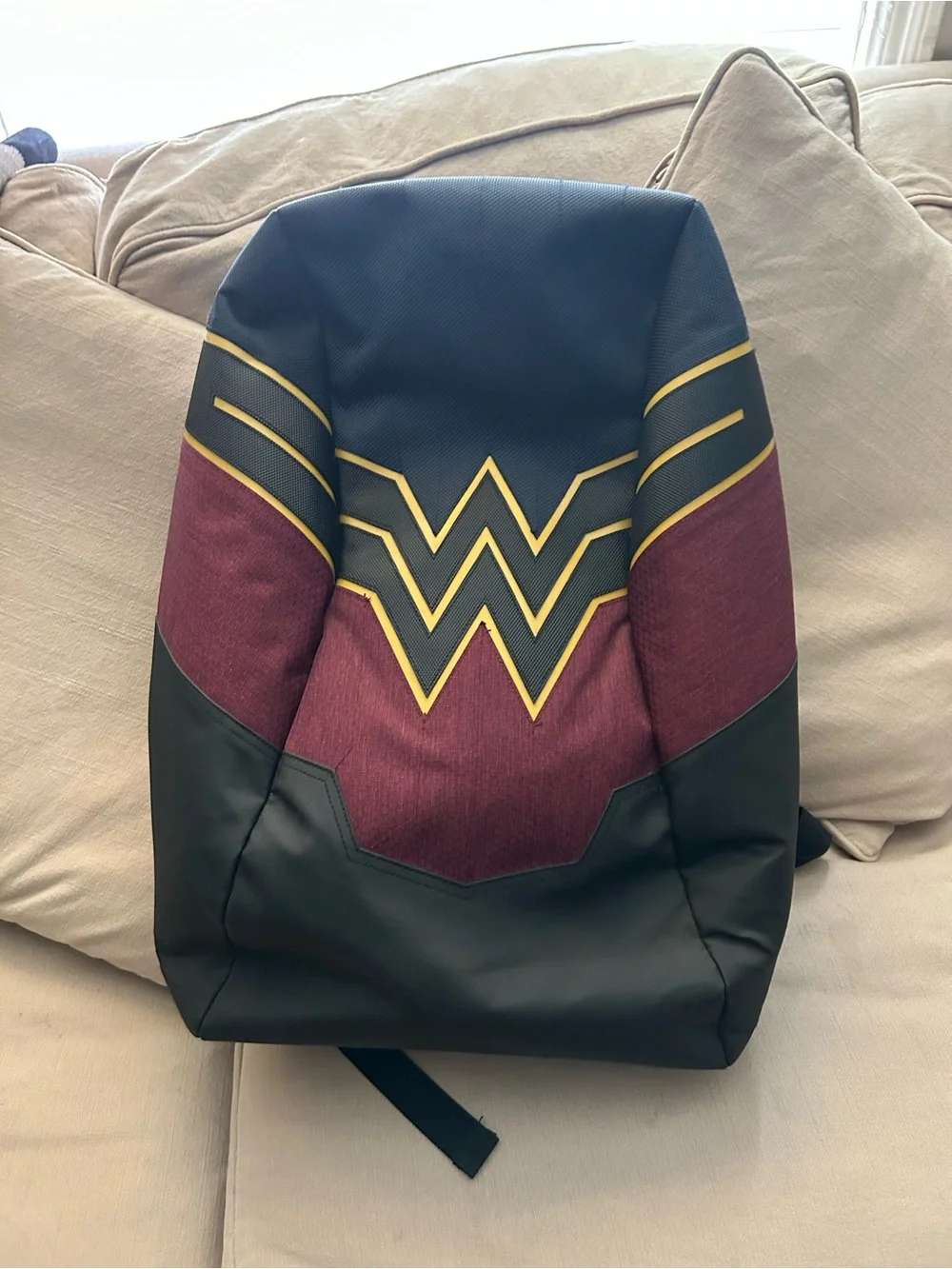 Superhero-Inspired Red and Black Backpack with Yellow Accent